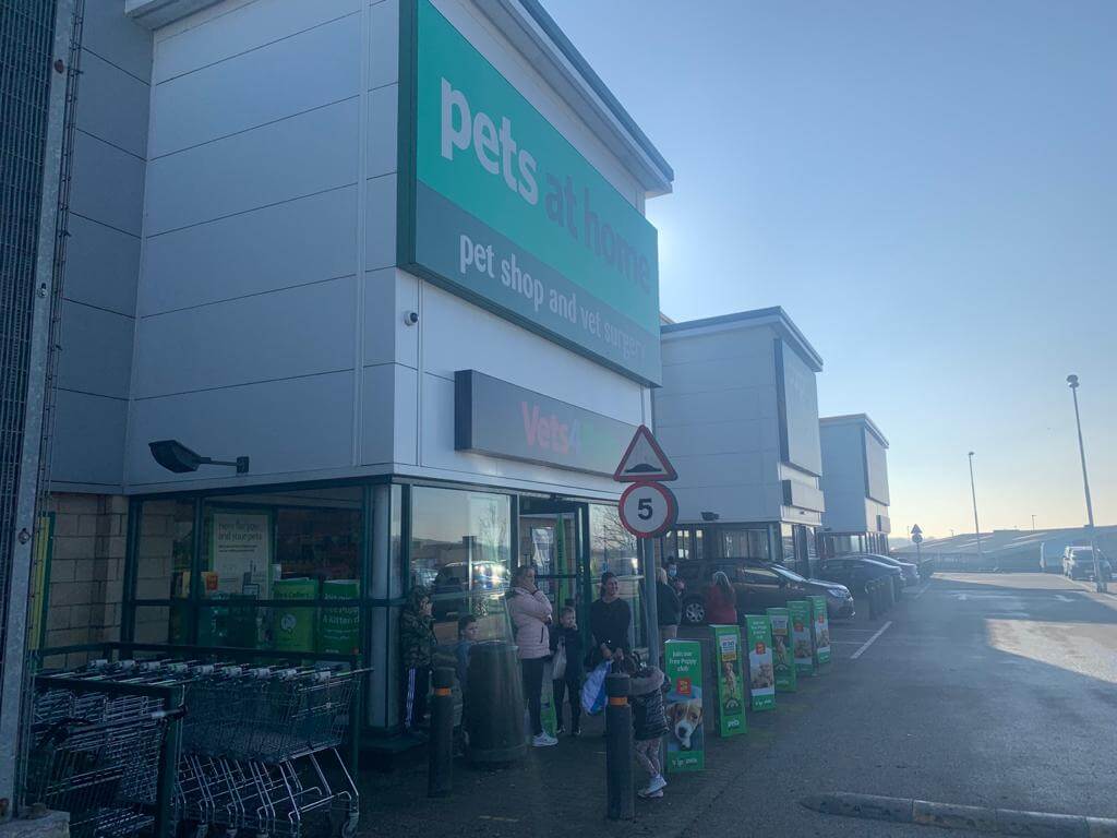 After view of three large commercial shops in a row with cleaned fronts after eco friendly blasting work carried out.