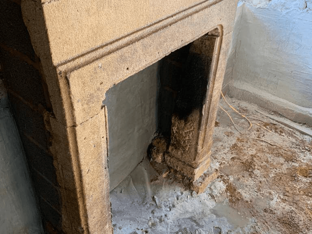 Sandblasted chimney breast and mantle.