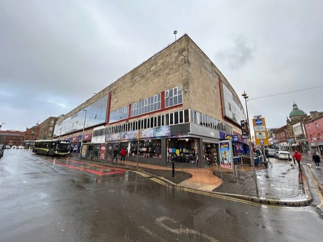 Wide angled before view of MBH shops in Blackpool town centre.