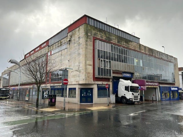 Wider angled before view of MBH shops in Blackpool town centre.