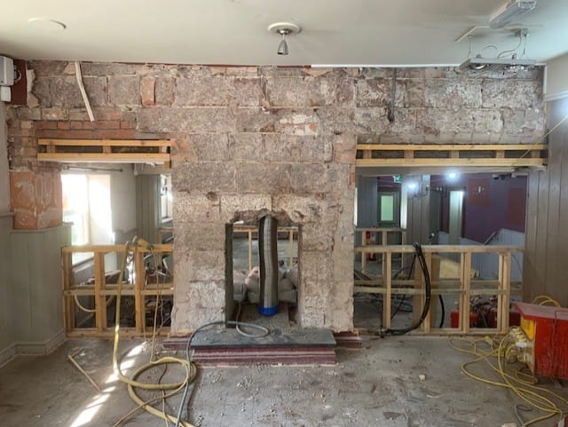 Before view of fireplace at Ring O Nells pub in West Kirby.