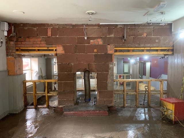 Red brickwork fireplace and surround at Ring O Nells pub in West Kirby.