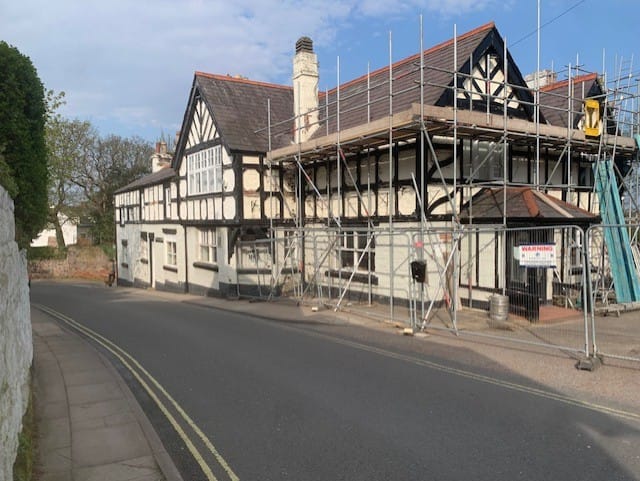 Roadside before view of Ring O Nells pub in West Kirby with scaffolding in place.